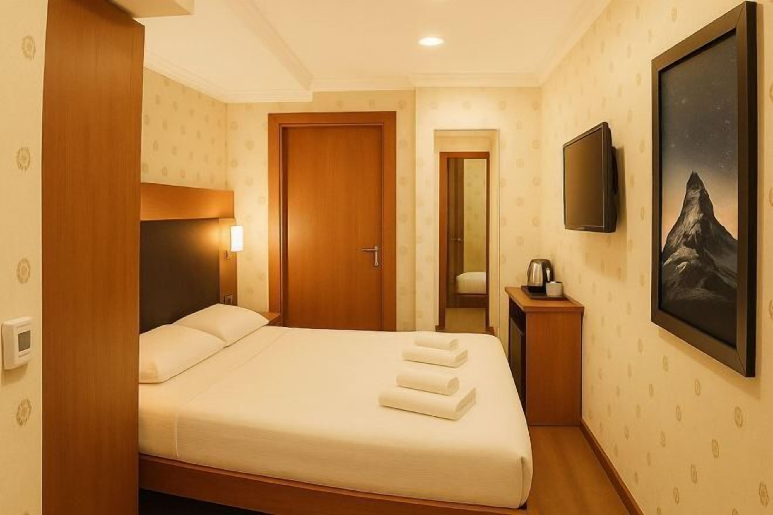 Egyptian cotton sheets, premium bedding, down comforters, minibar