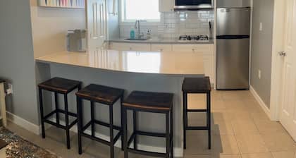 Prime Location, Steps from Beach, 2 BR, 1 BA with onsite parking spot
