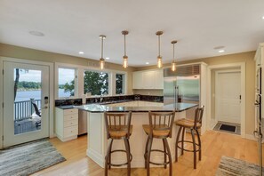 Fridge, microwave, oven, stovetop - 111’ of Sandy Beach Frontage on Long Lake | Hot Tub | Private Dock | Kayaks (Traverse City)