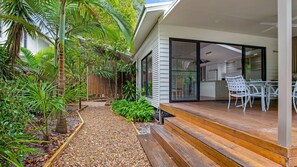 Enjoy meals in a comfortable dining area with a table and chairs.