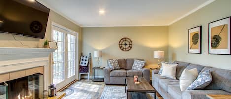 Smart TV, fireplace, books