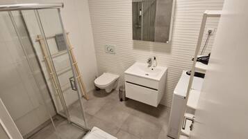 Departamento Confort | Baño | Piso con calefacción, jabón, shampoo