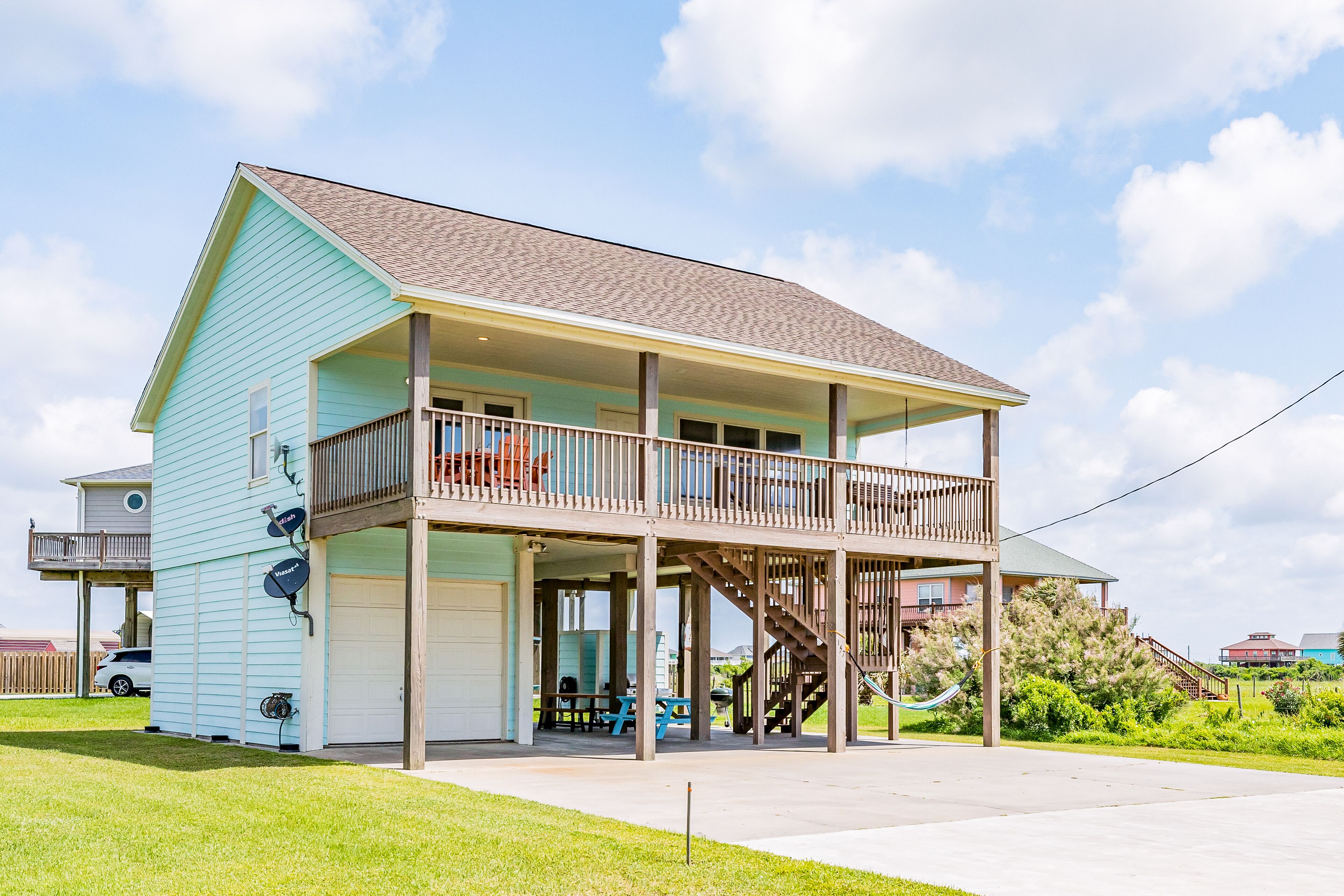 Dog-friendly beach escape w/ water views, private hot tub, WiFi, & full kitchen
