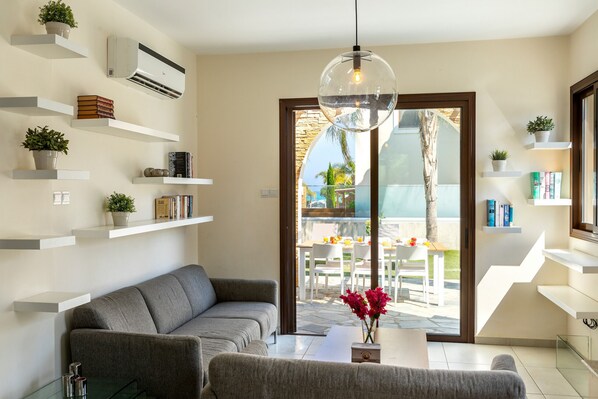 45-inch flat-screen TV with satellite channels, TV, fireplace - Ayia Napa Ionion Seaside Villa (Sotira)