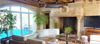 200mÂČ house in a renovated farmhouse, stone walls and exposed beams