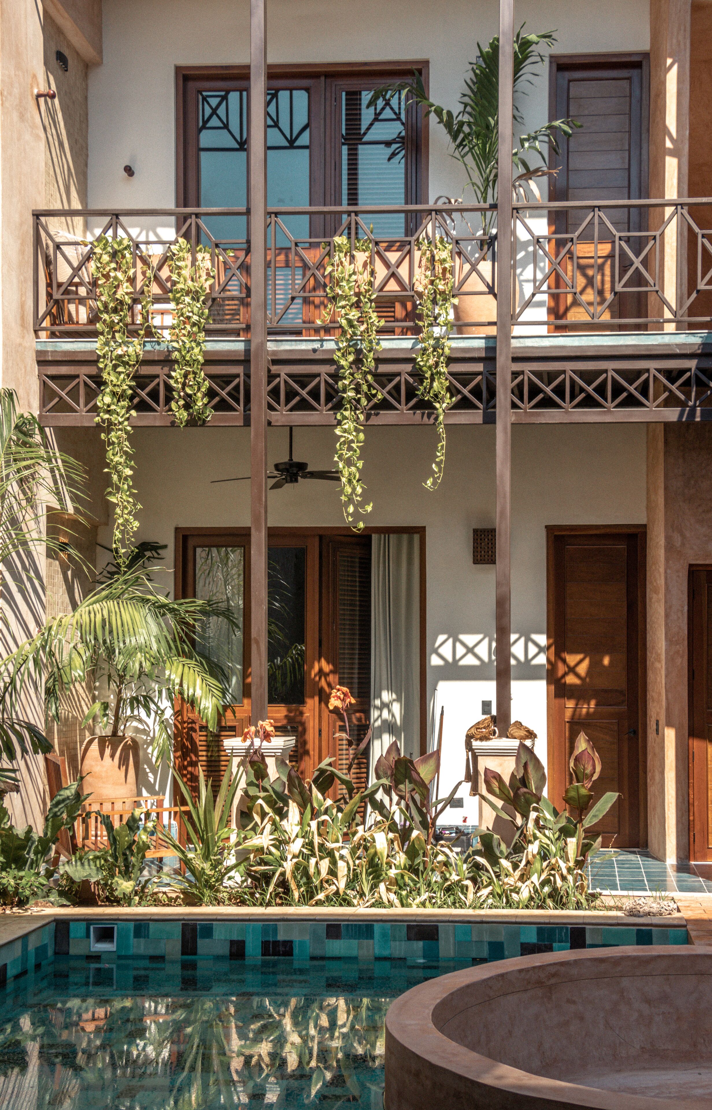 suite, 1 king bed, patio, pool view | 1 bedroom, desk, blackout curtains, iron/ironing board