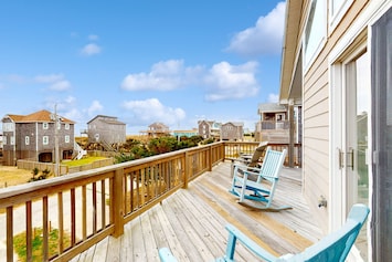 Image of Dreamy dog-friendly getaway with ocean views, beach access, fast WiFi, and deck