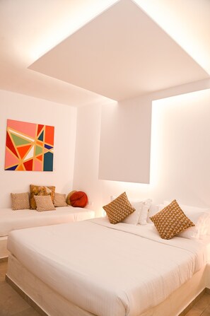 Ropa de cama de alta calidad, minibar, caja fuerte