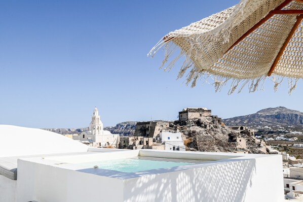 Enjoy panoramic views of the historic town from our rooftop infinity pool.