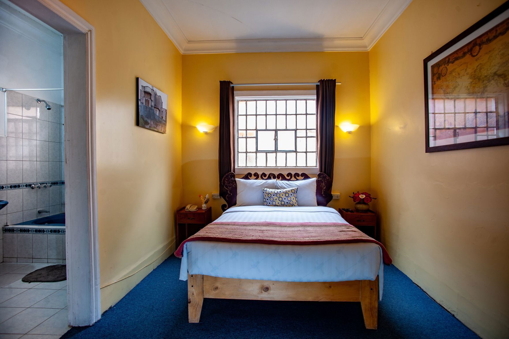 Premium bedding, down comforters, pillowtop beds, laptop workspace