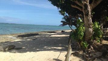 On the beach, sun-loungers, beach towels