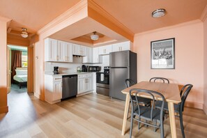 Fridge, coffee/tea maker, cookware/dishes/utensils, paper towels