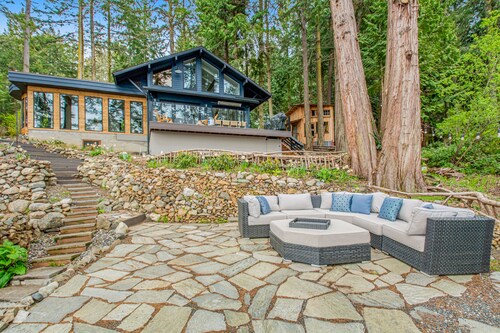 Stylish waterfront oasis w/ hot tub, fiber optic internet, & entertainer's deck