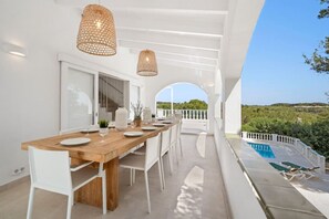 Outdoor dining - Magnificent Villa Luminosa- private pool and views (Port d`Addaia)