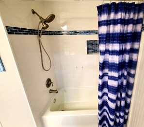 Combined shower/bathtub