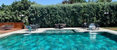 Outdoor pool, free cabanas, pool umbrellas