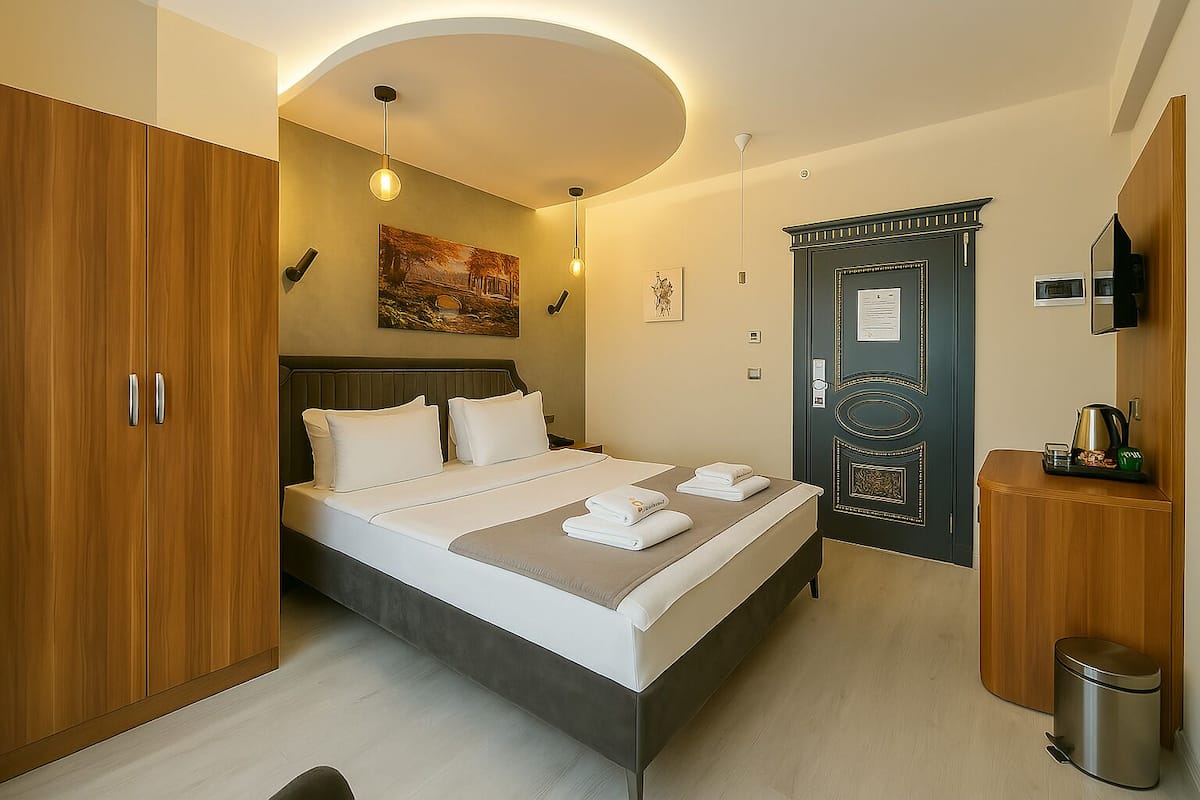 Economy Double Room | 1 bedroom, premium bedding, minibar, in-room safe