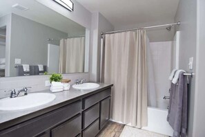 Combined shower/bathtub, hair dryer