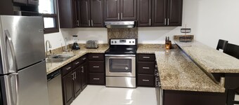 Beautiful New 2 Bedroom 3 Full Bath Condo with Attached Garage