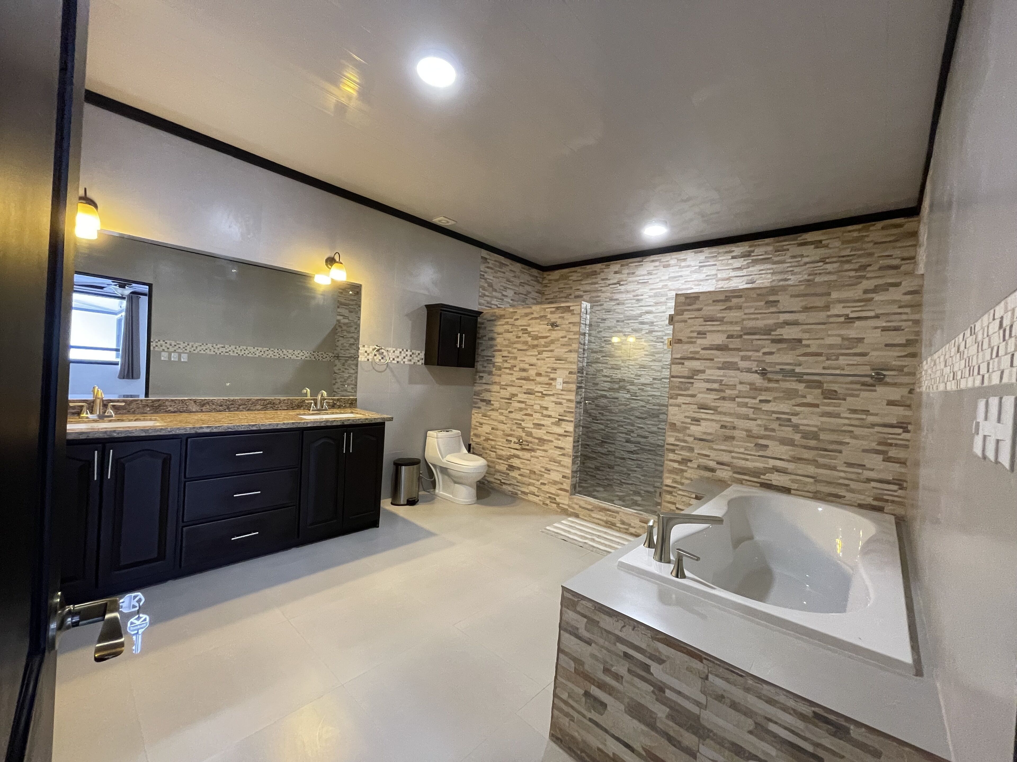 Bathtub, hair dryer, towels, soap