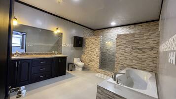 Bathtub, hair dryer, towels, soap