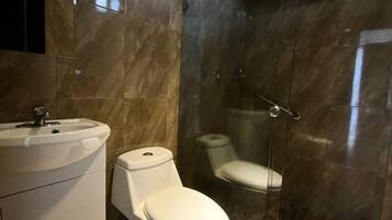 Designer toiletries, towels, soap, shampoo