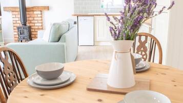 Cabin | Private kitchen | Fridge, microwave, oven, stovetop