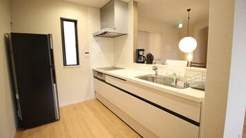 Fridge, microwave, stovetop, cookware/dishes/utensils