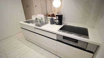 Fridge, microwave, stovetop, cookware/dishes/utensils