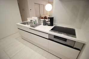 Fridge, microwave, stovetop, cookware/dishes/utensils