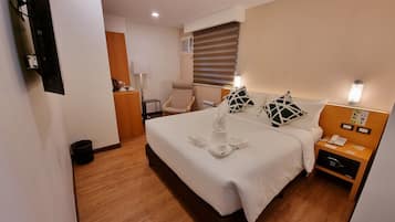 Habitación Premier (Deluxe) | Caja fuerte, wifi gratis, ropa de cama