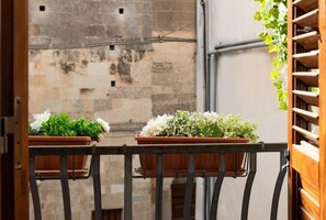 Casa, varias camas | Balcón