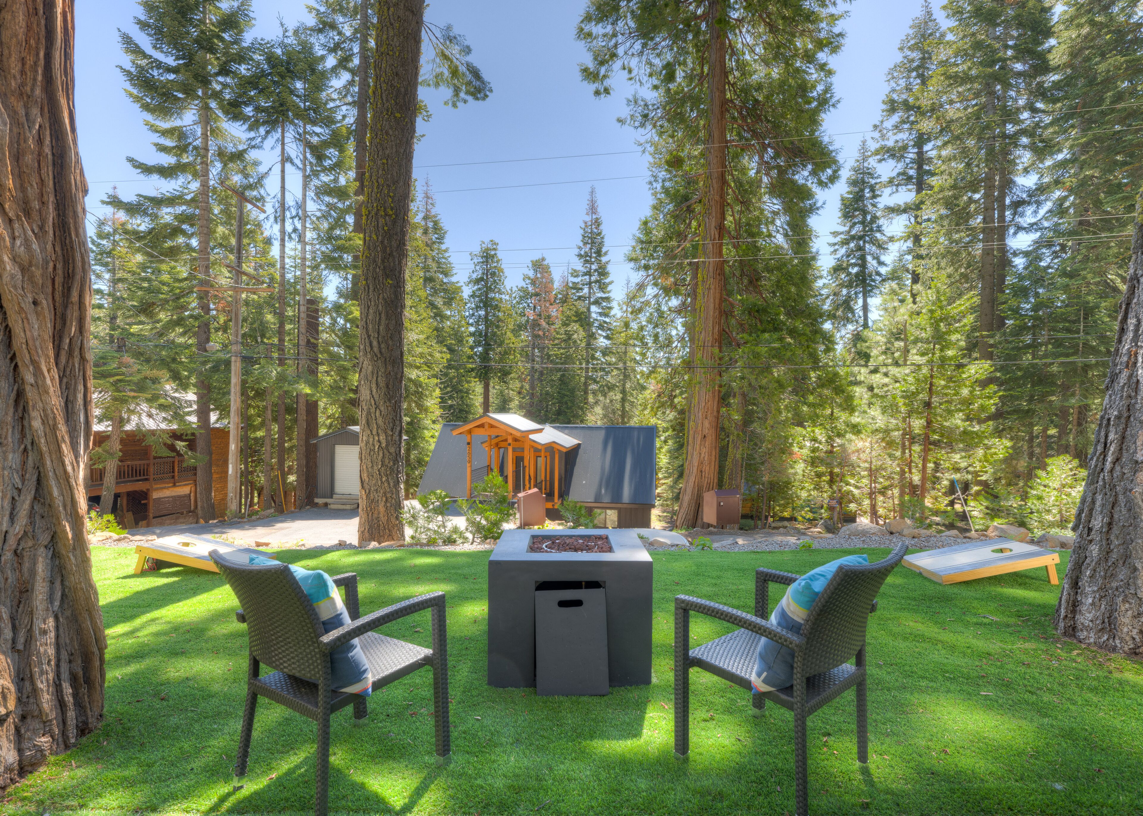 Sleek mountain retreat with furnished deck, firepit, & walkable beach access