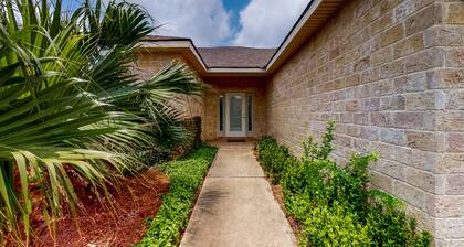 Inviting dog-friendly getaway with screened sunroom, pool, pickleball, & tennis