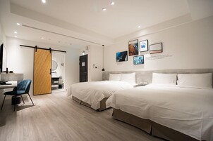 Premium bedding, down duvets, desk, laptop workspace