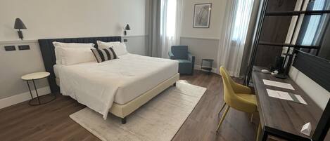 Habitación superior | Ropa de cama de alta calidad y edredones de plumas