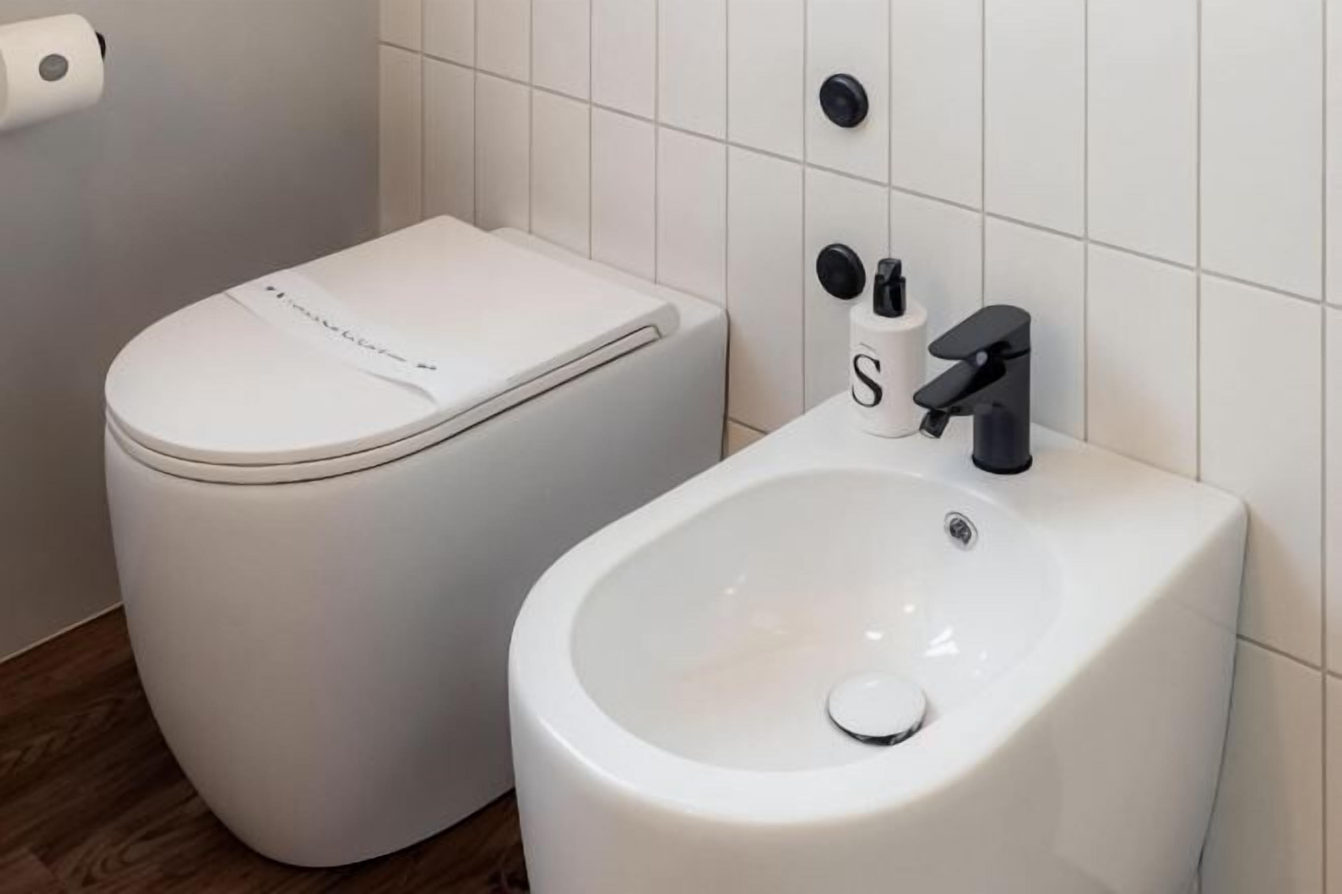 Bathroom | Shower, rainfall showerhead, hair dryer, towels