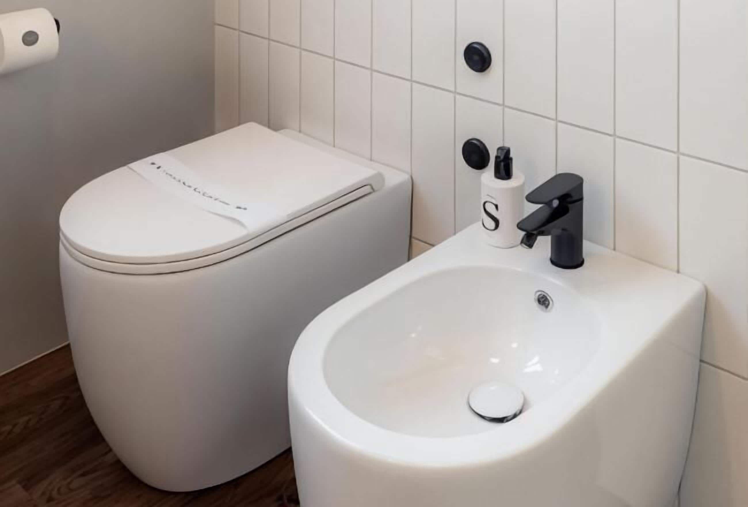 Bathroom | Shower, rainfall showerhead, hair dryer, towels