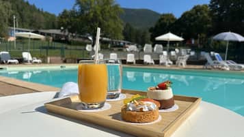 Seasonal outdoor pool, pool umbrellas, pool loungers
