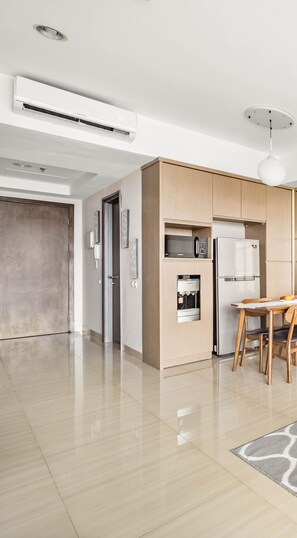 Apartment, 2 Bedrooms, City View | Living area | 43-inch Smart TV with cable channels, TV, Netflix - SOLEIL by Kozystay (Jakarta)
