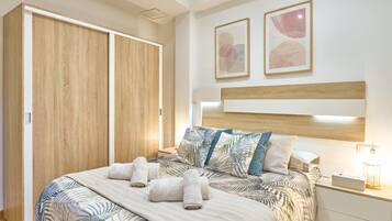 1 habitación, tabla de planchar con plancha, wifi gratis y ropa de cama