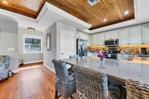 Fridge, microwave, oven, stovetop - Whispering Winds by Beach Boutique Rentals (Anna Maria)