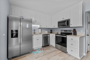 Fridge, microwave, oven, stovetop - Oceanside Condo in Atlantic Beach, NC-Anchors Away Unit 1 (Atlantic Beach)