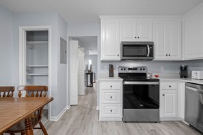 Fridge, microwave, oven, stovetop - Oceanside Condo in Atlantic Beach, NC-Anchors Away Unit 2 (Atlantic Beach)