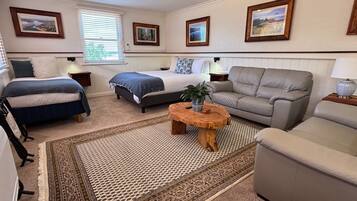 Tabla de planchar con plancha, wifi gratis y ropa de cama