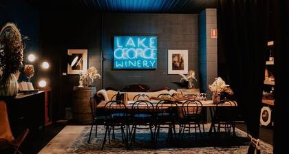 Baxter at Lake George Winery by Tiny Away