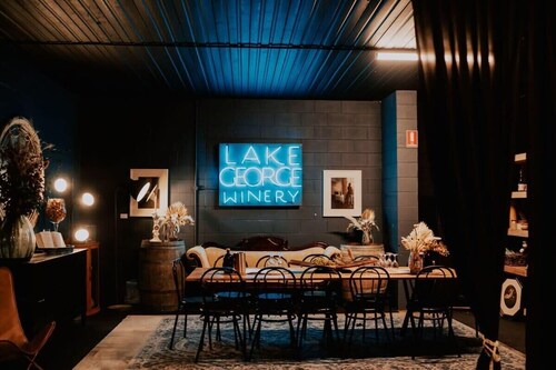 Baxter at Lake George Winery by Tiny Away