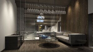 A modern interior with a kitchen, dining area, and living space.
