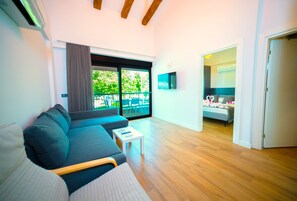 Sweet Home Apartments Annex Building C | Living area | 43-inch LCD TV with cable channels, TV