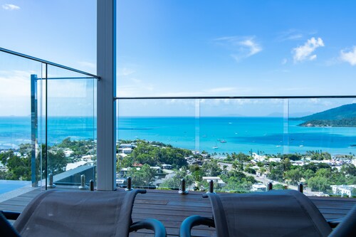 Relax in style as you overlook the Coral Sea and Whitsunday Islands beyond